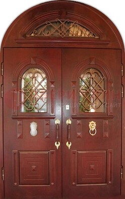 Стальная арочная дверь со стеклом и ковкой ДА-30 в дом из кирпича в Казани