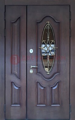 Темная металлическая дверь Винорит со стеклом и ковкой ДСК-239 в Казани