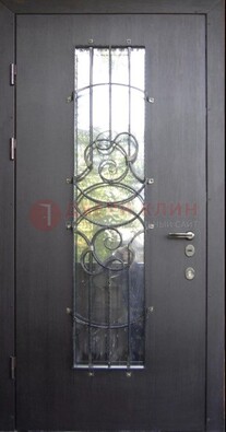 Остекленная стальная дверь с ковкой ДСК-26 в Саратове