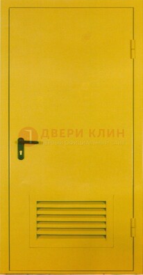 Желтая металлическая противопожарная дверь с вентиляционной решеткой ДТ-15 в Казани